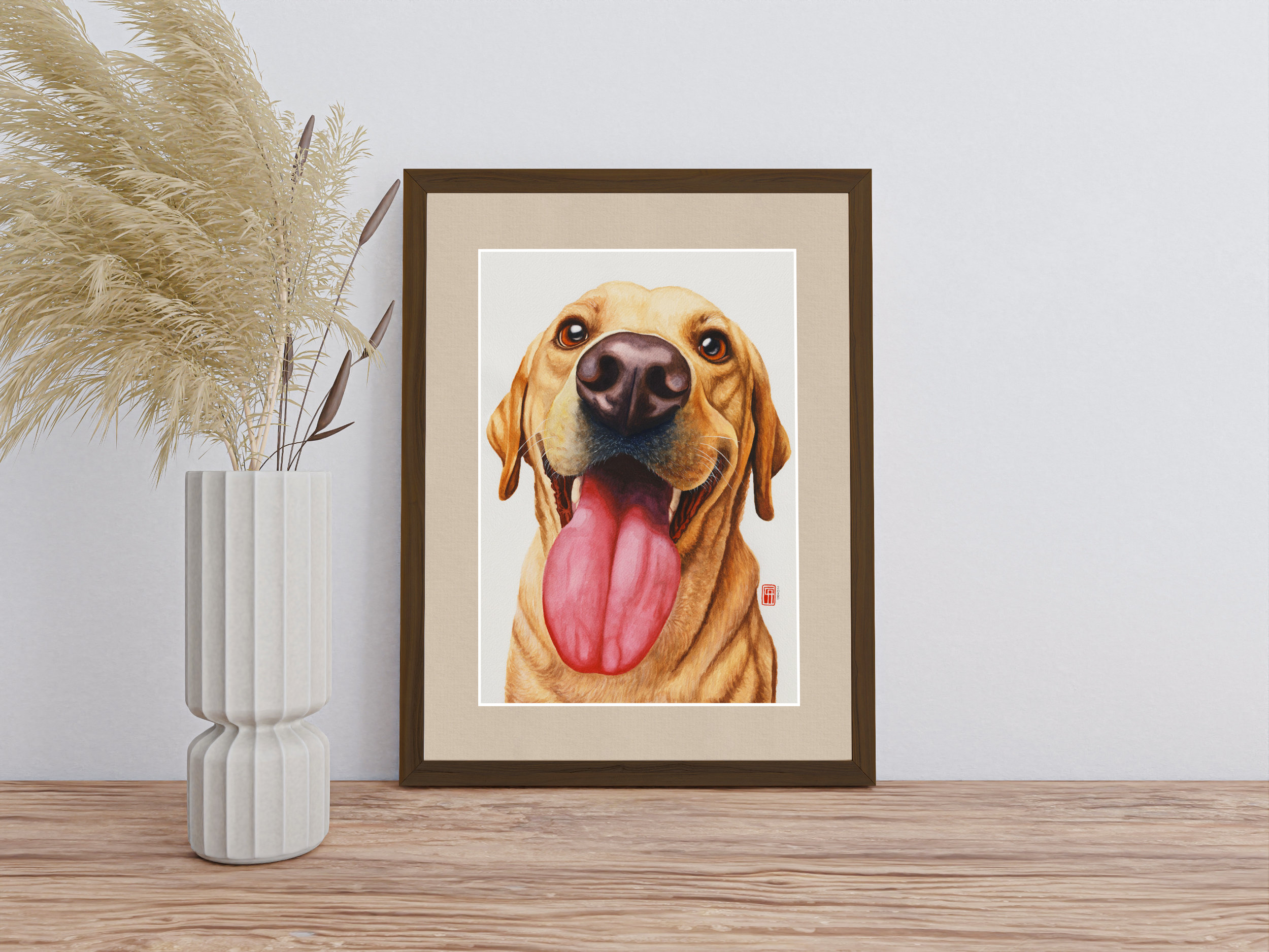 Aquarell eines Labradors, der mit leuchtenden Augen und herausgestreckter Zunge dem Betrachter entgegenlacht